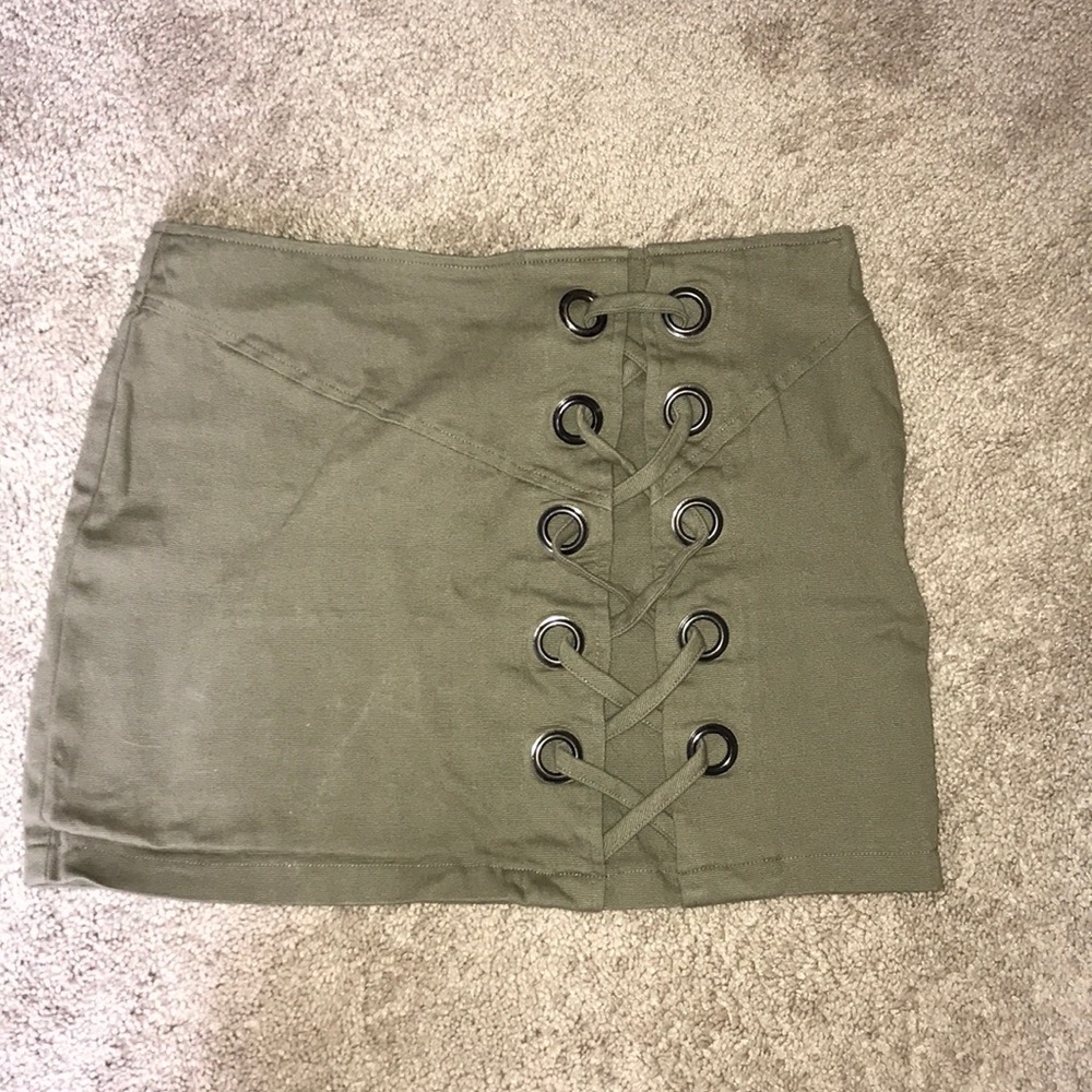 Army green mini skirt with criss-cross detail